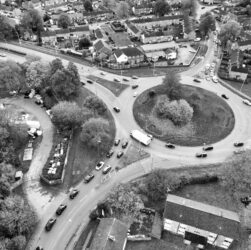 grayscale shot of a roundabout in a city